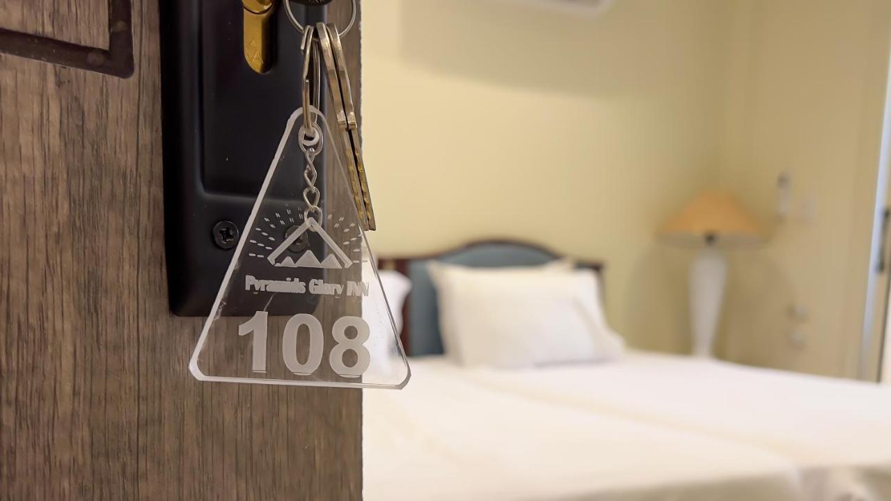 Pyramids Glory Inn Kafrat al Jabal Bagian luar foto
